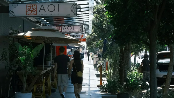 People walking past shops in central Auckland
