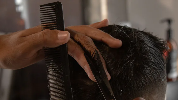 Close view of a precision scissor haircut